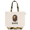 1st Camo Ape Head Tote Bag - Ivory 2 1st Camo Ape Head Tote Bag - Ivory -Feature store 1st Camo Ape Head Tote Bag Ivory 001BAK801009M IVY 08 13 24 Feature JP 2