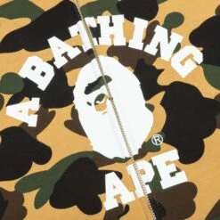 1st Camo Crazy College Full Zip Hoodie - Yellow 11 1st Camo Crazy College Full Zip Hoodie - Yellow -Feature store A Bathing Ape 1St Camo Crazy College Full Zip Hoodie Yellow 001ZPJ301015MYEL 03 01 23 Feature VR 6