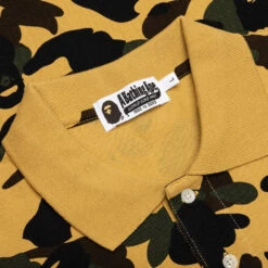 1st Camo One Point Relaxed Fit Polo - Yellow -Feature store A Bathing Ape 1St Camo One Point Relaxed Fit Polo Yellow 001POJ301004M YEL 06 29 23 Feature KN 8