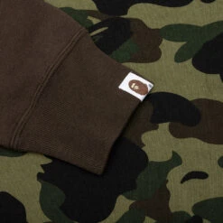 1st Camo Crazy NYC Logo Relaxed Fit Crewneck - Green 9 1st Camo Crazy NYC Logo Relaxed Fit Crewneck - Green -Feature store A Bathing Ape 1st Camo Crazy NYC Logo Relaxed Fit Crewneck Green 001SWJ301010M 04 14 23 Feature KN 5