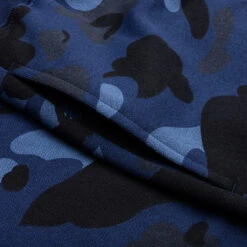 Color Camo Cutting Sweat Shorts - Navy 10 Color Camo Cutting Sweat Shorts - Navy -Feature store A Bathing Ape Color Camo Cutting Sweat Shorts Navy 001SPJ301012M NVY 06 30 23 Feature JP 10