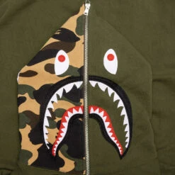 Military Shark Relaxed Fit Full Zip Hoodie - Olive Drab -Feature store A Bathing Ape Military Shark Relaxed Fit Full Zip Hoodie Olive Drab 001ZPI301019M OLD 01 03 23 Feature VR 12