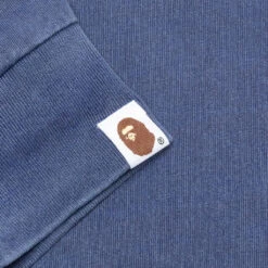 Overdye College L/S Tee - Navy 9 Overdye College L/S Tee - Navy -Feature store A Bathing Ape Overdye College L S Tee Navy 001LTJ301018M NVY 04 17 23 Feature KN 5