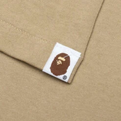 Colors By Bathing Ape Tee - Beige 9 Colors By Bathing Ape Tee - Beige -Feature store Colors By Bathing Ape Tee Beige 001TEK301015M BEI 07 31 24 Feature KN 5