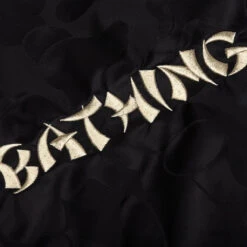 Reversible Souvenir Jacket - Black 12 Reversible Souvenir Jacket - Black -Feature store Reversible Souvenir Jacket Black 001LJK301309M BLK 03 19 24 Feature DV 9